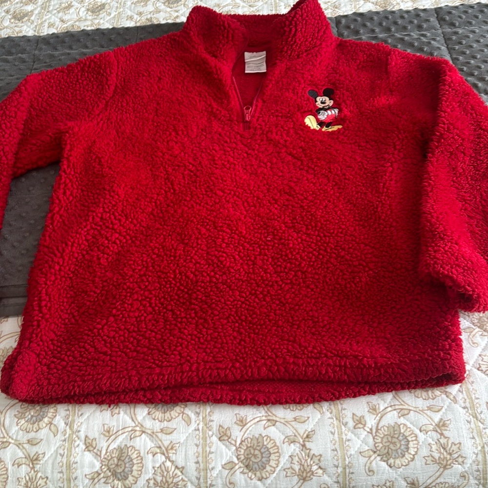 Disney red pullover jacket.